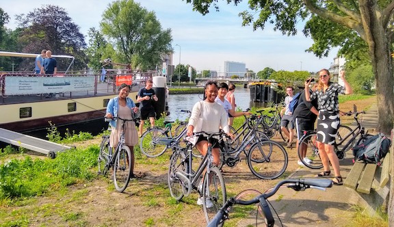 Students Moving from Boat to Bike at the Hague